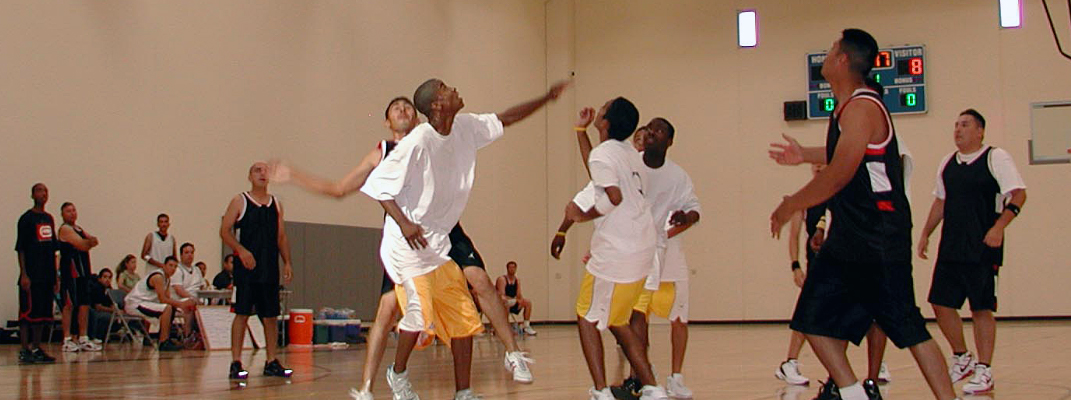 Adult basketball players.